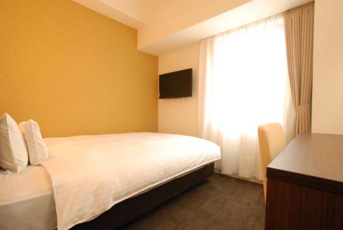 Imagen de la habitación del Hotel AB Isesaki. Foto 5