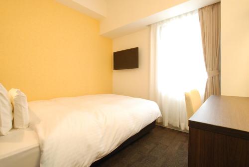 Imagen de la habitación del Hotel AB Mikawa Toyota. Foto 4