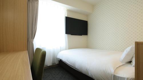 Imagen de la habitación del Hotel AB Sakaihigashi. Foto 7