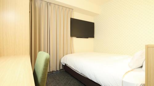 Imagen de la habitación del Hotel AB Sakaihigashi. Foto 8