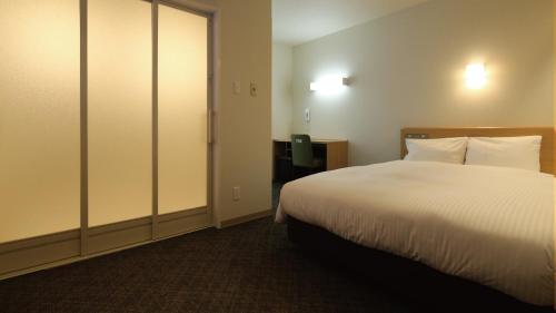 Imagen de la habitación del Hotel AB Sakaihigashi. Foto 9