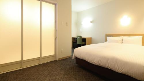 Imagen de la habitación del Hotel AB Sakaihigashi. Foto 10