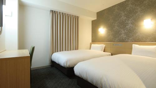 Imagen de la habitación del Hotel AB Sakaihigashi. Foto 13
