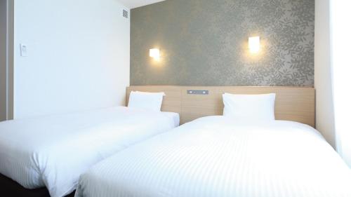 Imagen de la habitación del Hotel AB Sakaihigashi. Foto 14