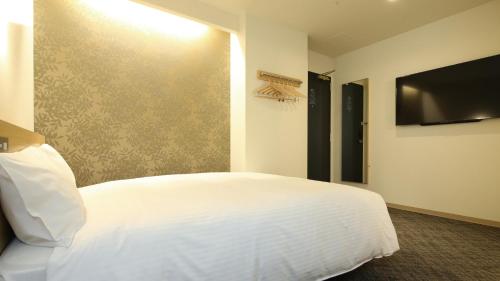 Imagen de la habitación del Hotel AB Sakaihigashi. Foto 15