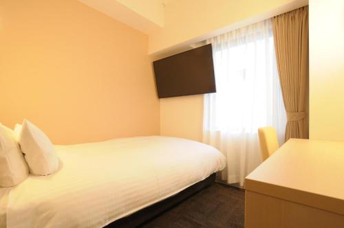 Imagen de la habitación del Hotel AB Ubeshinkawa. Foto 6