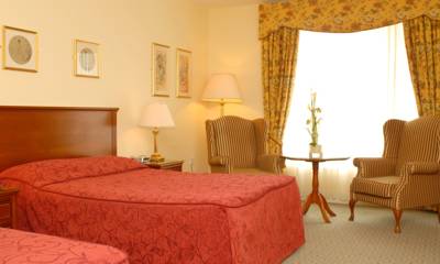 Imagen de la habitación del Hotel ABBEY. Foto 9