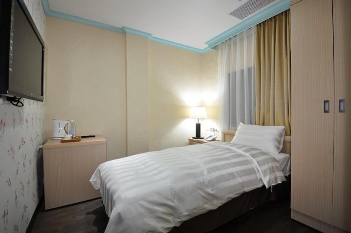 Imagen de la habitación del Hotel ACASA, TAOYUAN. Foto 6