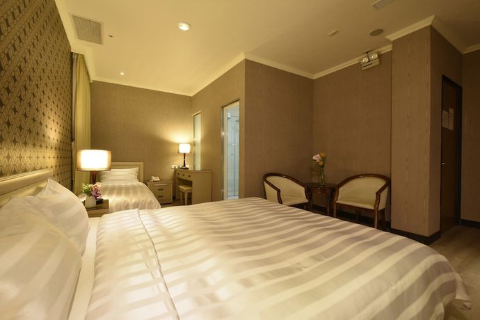 Imagen de la habitación del Hotel ACASA, TAOYUAN. Foto 7