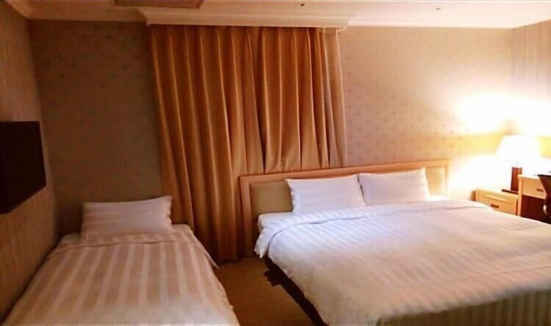 Imagen de la habitación del Hotel ACASA, TAOYUAN. Foto 14