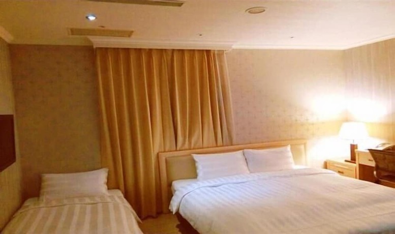 Imagen de la habitación del Hotel ACASA, TAOYUAN. Foto 15