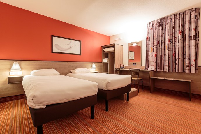 Imagen de la habitación del Hotel ACE Hôtel Paris Roissy. Foto 14