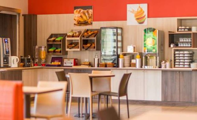 Imagen de los interiores del Hotel ACE Hôtel Paris Sud Villabe. Foto 7