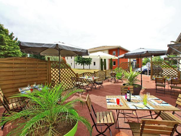Imagen del bar/restaurante del Hotel ACE H&ocirc;tel Vend&eacute;e Saint Hermine. Foto 2