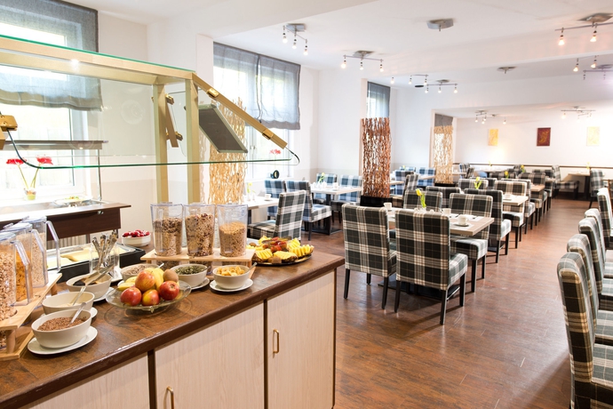 Imagen del bar/restaurante del Hotel ACHAT Hotel Frankfurt Airport. Foto 2