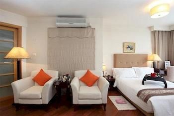 Imagen de la habitación del Hotel ACME Riverside Service Apartment. Foto 7