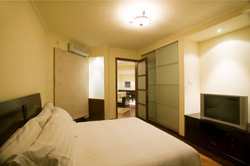 Imagen de la habitación del Hotel ACME Riverside Service Apartment. Foto 8