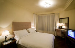 Imagen de la habitación del Hotel ACME Riverside Service Apartment. Foto 12