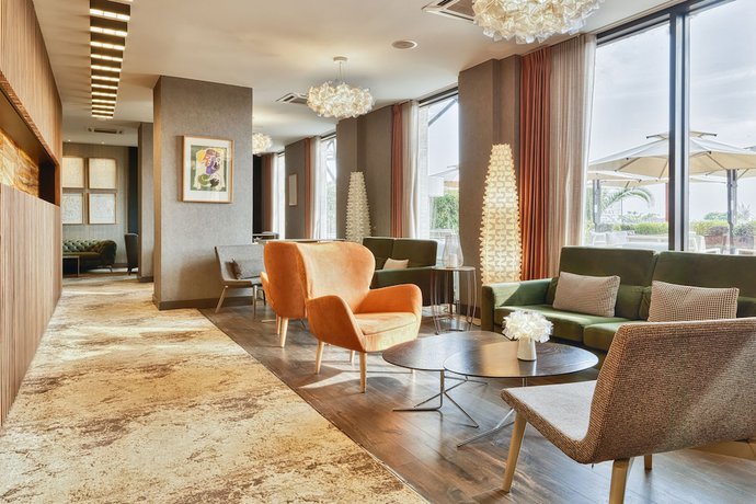 Imagen del bar/restaurante del Hotel ADAM Suites. Foto 4