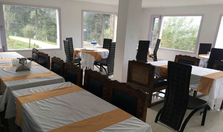 Imagen del bar/restaurante del Hotel ADB Rooms Patnitop. Foto 10