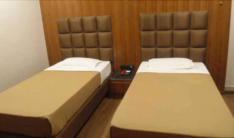 Imagen de la habitación del Hotel ADB Rooms Surabhi International. Foto 3