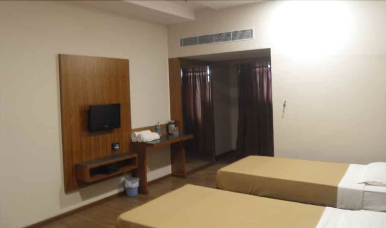 Imagen de la habitación del Hotel ADB Rooms Surabhi International. Foto 5