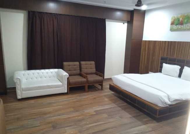 Imagen de la habitación del Hotel ADB Rooms Surabhi International. Foto 8