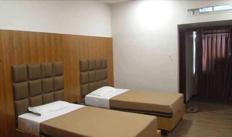 Imagen de la habitación del Hotel ADB Rooms Surabhi International. Foto 11