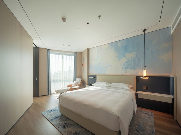 Imagen de la habitación del Hotel ADEN Shenzhen Nanshan. Foto 7
