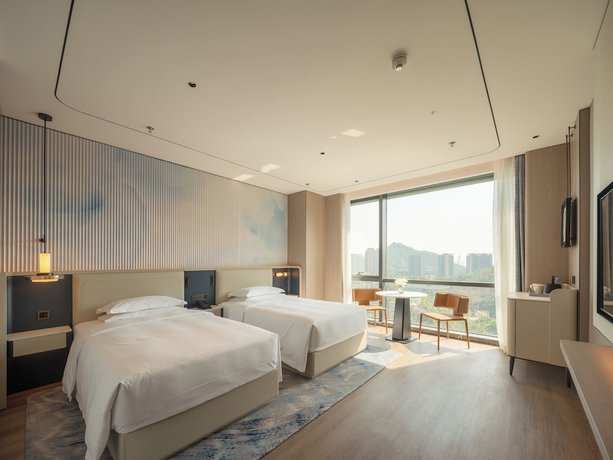 Imagen de la habitación del Hotel ADEN Shenzhen Nanshan. Foto 10