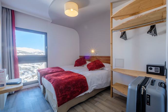 Imagen de la habitación del Hotel AEC Vacances - Le Grand Fourchon. Foto 6