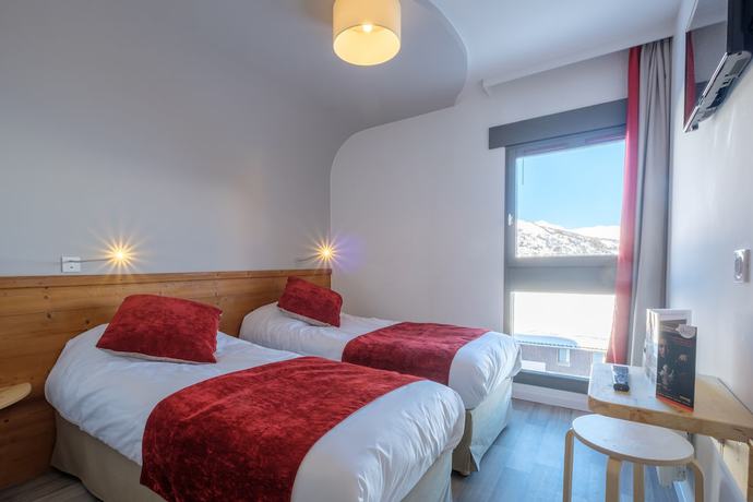 Imagen de la habitación del Hotel AEC Vacances - Le Grand Fourchon. Foto 8