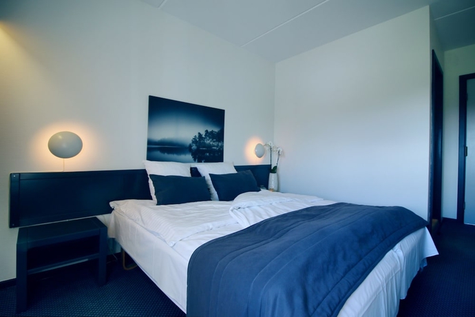 Imagen de la habitación del Hotel &AElig;r&oslash; - Adults Only. Foto 8