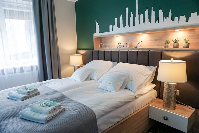 Imagen de la habitación del Hotel AGA Tenis Apartments by Radwanska. Foto 10