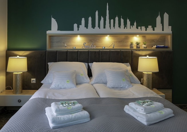 Imagen de la habitación del Hotel AGA Tenis Apartments by Radwanska. Foto 11