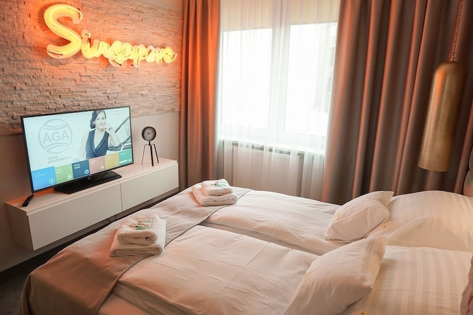Imagen de la habitación del Hotel AGA Tenis Apartments by Radwanska. Foto 13