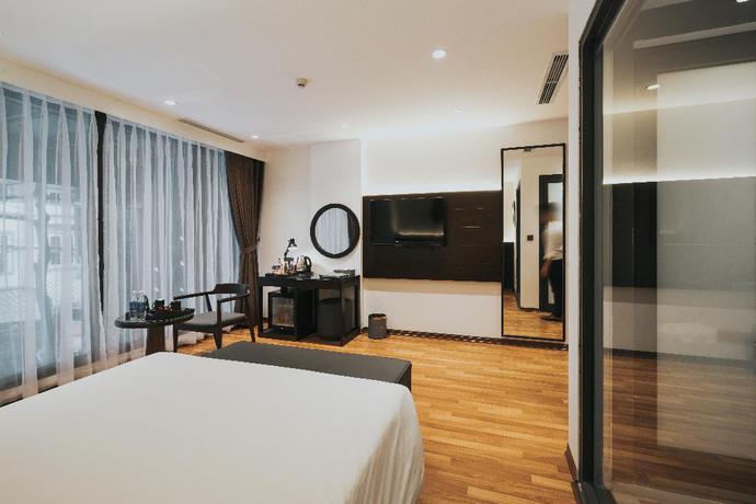 Imagen de la habitación del Hotel AHA COMMENCER HOTEL HANOI. Foto 7