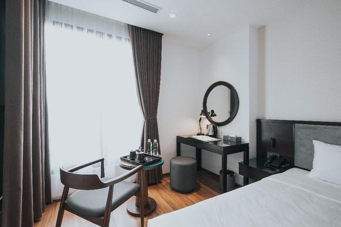 Imagen de la habitación del Hotel AHA COMMENCER HOTEL HANOI. Foto 12