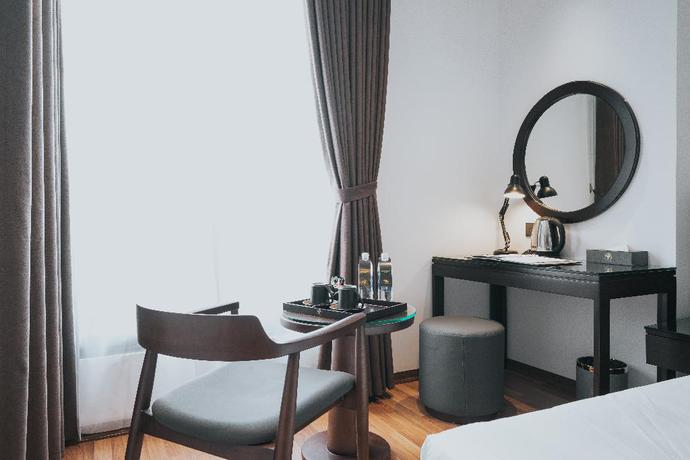 Imagen de la habitación del Hotel AHA COMMENCER HOTEL HANOI. Foto 13