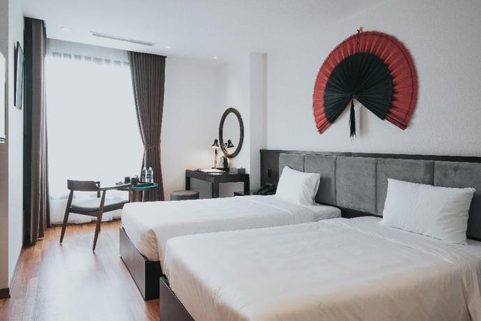 Imagen de la habitación del Hotel AHA COMMENCER HOTEL HANOI. Foto 14
