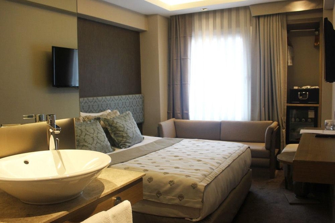 Imagen de la habitación del Hotel AHC Grand Bazaar. Foto 5