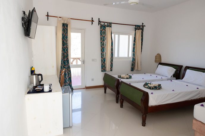 Imagen de la habitación del Hotel AHG Sun Bay Mlilile Beach. Foto 6