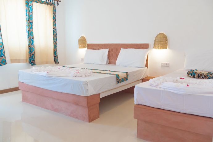 Imagen de la habitación del Hotel AHG Sun Bay Mlilile Beach. Foto 7