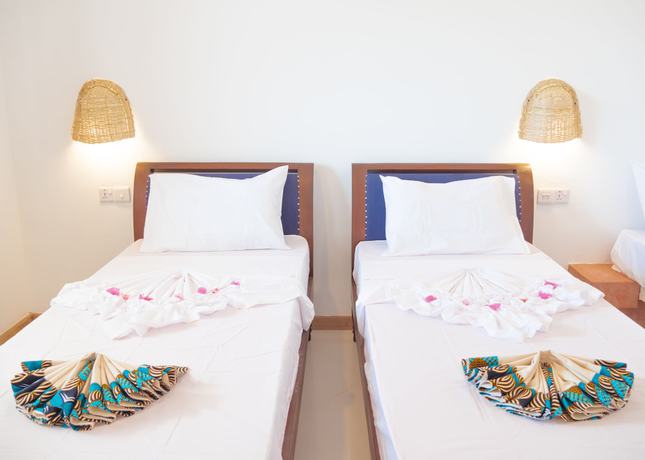 Imagen de la habitación del Hotel AHG Sun Bay Mlilile Beach. Foto 13