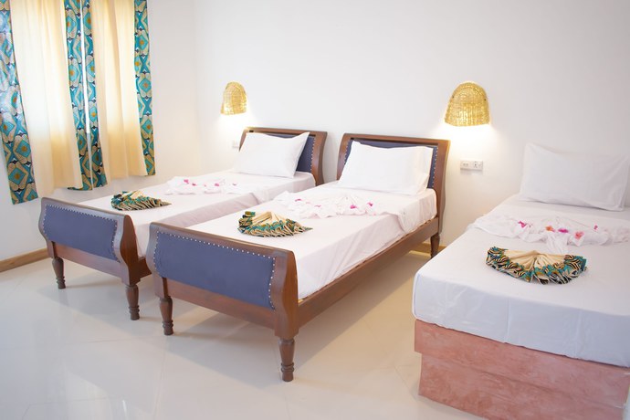 Imagen de la habitación del Hotel AHG Sun Bay Mlilile Beach. Foto 14