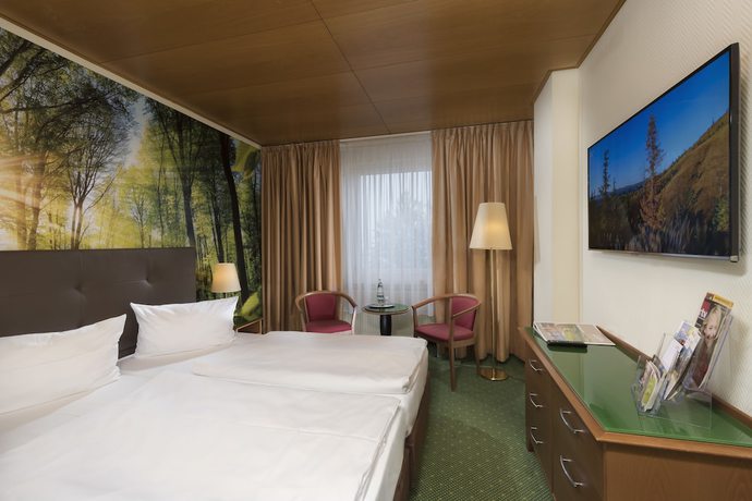 Imagen de la habitación del Hotel AHORN Waldhotel Altenberg. Foto 2