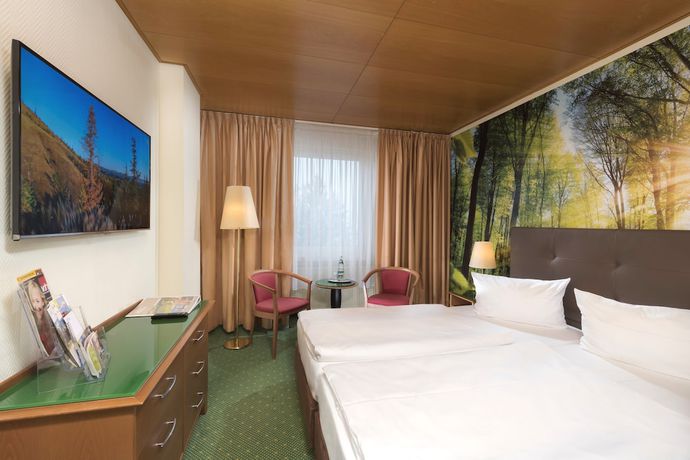 Imagen de la habitación del Hotel AHORN Waldhotel Altenberg. Foto 3