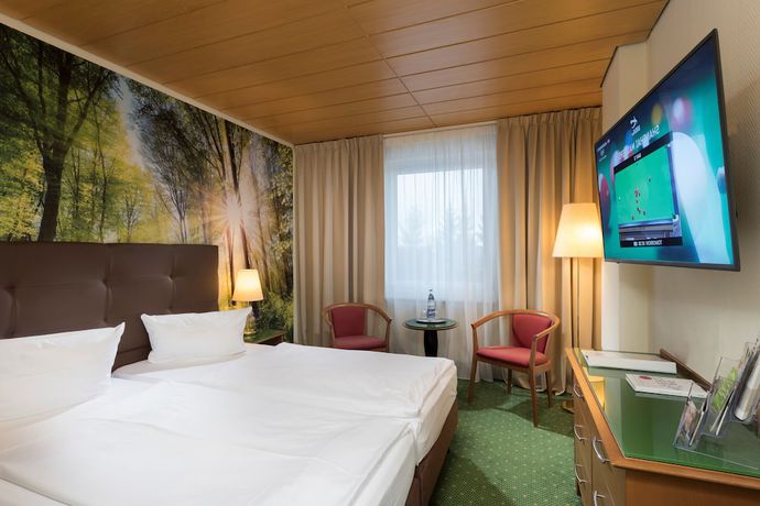 Imagen de la habitación del Hotel AHORN Waldhotel Altenberg. Foto 5