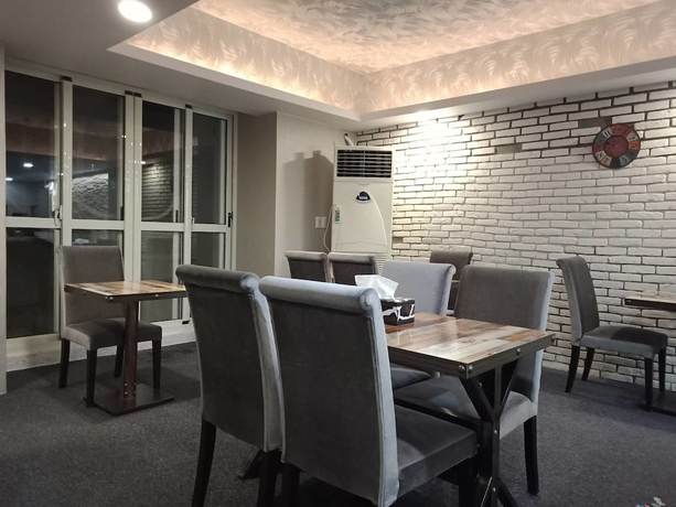 Imagen del bar/restaurante del Hotel AI YUE HOTEL. Foto 3