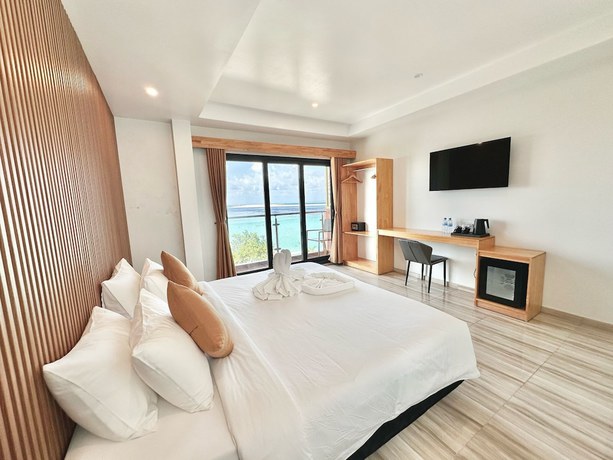 Imagen de la habitación del Hotel AIMI Beach, Gulhi Island, Maldives. Foto 7